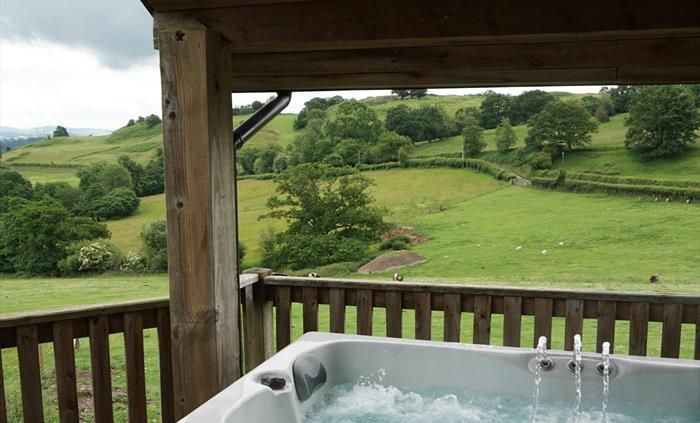 Take in the amazing views whilst relaxing in your own private hot tub